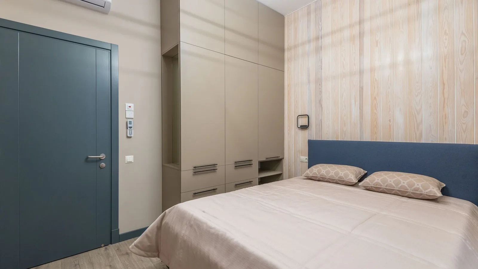 Wall-mounted mini split indoor unit in a finished bedroom, a diy mini split heat pump best 2026 installation